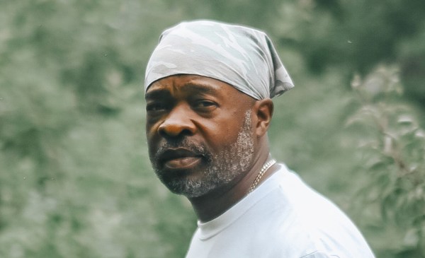 Jason Tartt photographed in an orchard on his sustainable farm in Vallscreek, West Virginia.