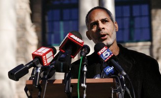 Kamau Franklin speaking at a press conference